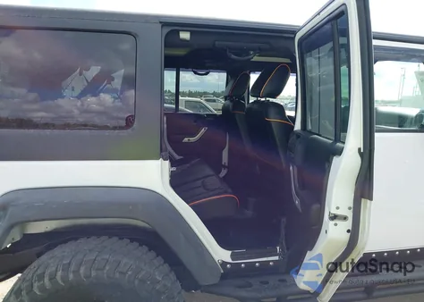 2011 Jeep Wrangler Unlimited Rubicon z USA, uszkodzony, nr VIN 1J4BA6H10BL536027